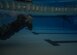A U.S. Army Soldier struggles to remove his uniform during the underwater portion of the German Armed Forces Badge for military Proficiency (GAFBP) competition held at Fr. Drum, N.Y. on Saturday, march 11, 2017. The day began with 84 competitors and ended with 40 qualified finishers. The pool portion of the contest is where most participants were eliminated. (U.S. Air Force photo by Staff Sgt. Richard Mekkri)