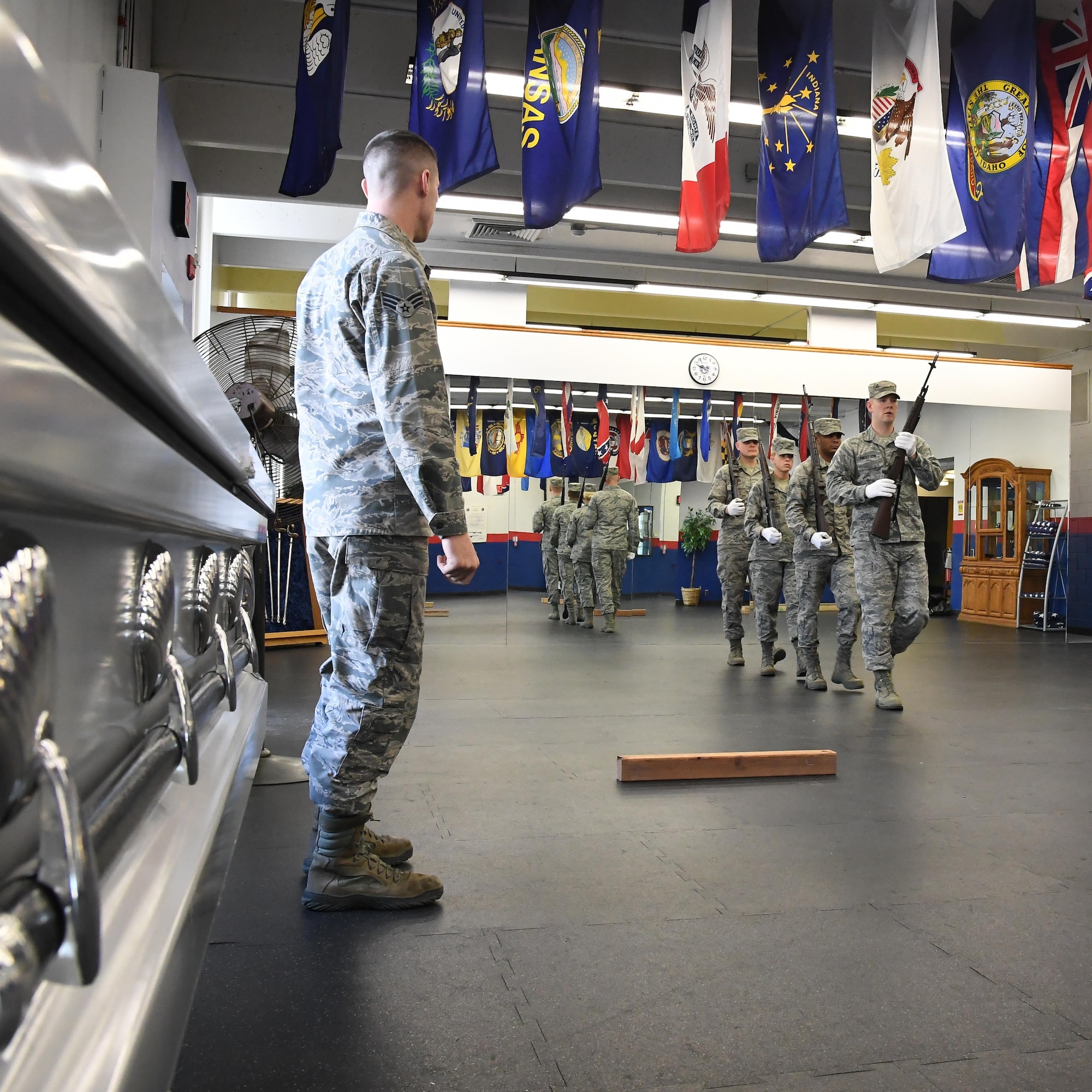 Hill AFB Honor Guard members conduct rippled movement drills under the watchful eye of Lead Honor Guard Instructor Senior Airman Timothy Potter, March 7, 2017. Ripple movements are initiated by the first rank and repeated down the ranks on each left heel beat creating a rippled, or waved, appearance. Ceremonial guardsmen are experts in military drill, ceremonies and protocol. (U.S. Air Force photo/R. Nial Bradshaw)