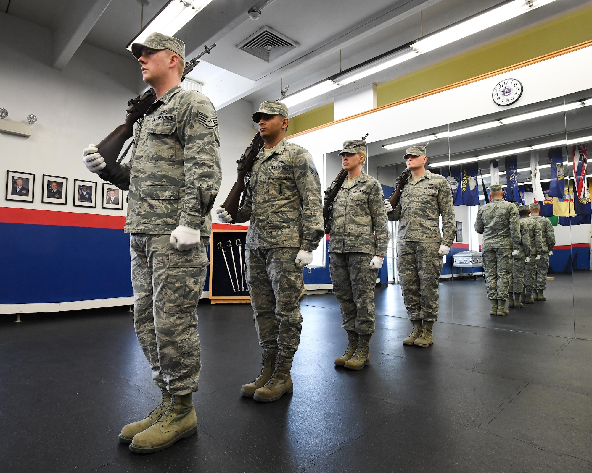 Hill AFB Honor Guard members practice standing and marching drill movements, Hill Air Force Base, Utah, March 7, 2017. Experts in military drill, ceremonies and protocol, the three flights of Hill’s honor guard each specialize in a particular ceremonial element. However, all members are trained and capable of performing all duties. (U.S. Air Force photo/R. Nial Bradshaw)