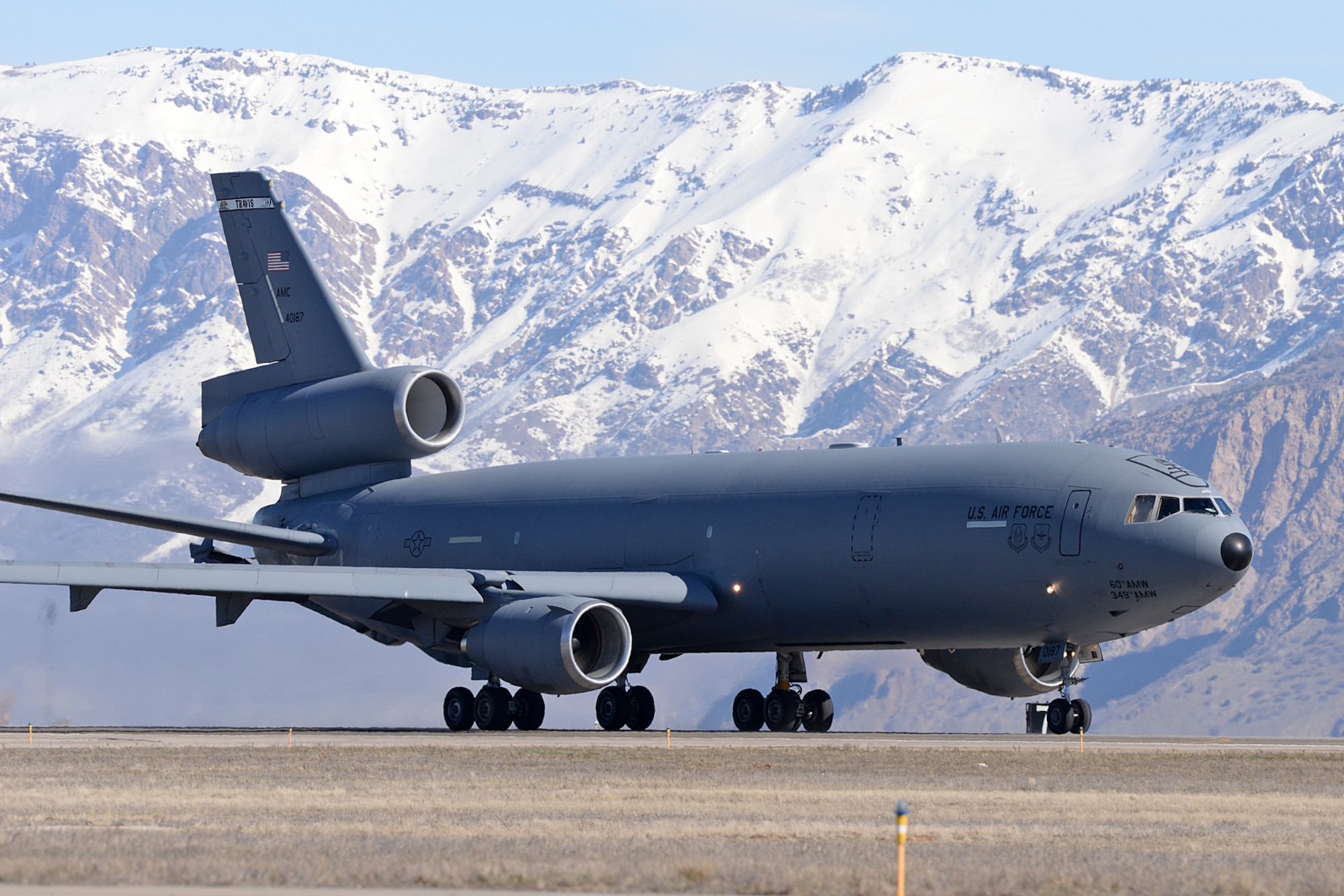 A U.S. Air Force KC-10 Extender tanker departs Hill Air Force Base on March 14 as the support aircraft for Indonesian Air Force Ferry Cell 5. The aircraft carried 573d Aircraft Maintenance Squadron personnel and equipment and will refuel the 4 F-16, Block 25 aircraft, on their transoceanic flight to Indonesia. (U.S. Air Force Photo by Alex R. Lloyd)