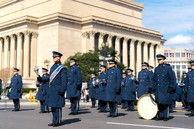 The U.S. Air Force Band stands at attention during the 46th Annual St. Patrick’s Day Parade in Washington, D.C., March 12, 2017. The band played for spectators along the parade’s Constitution Avenue route as part of its community relations mission. (U.S. Air Force photo by Senior Airman Delano Scott) 