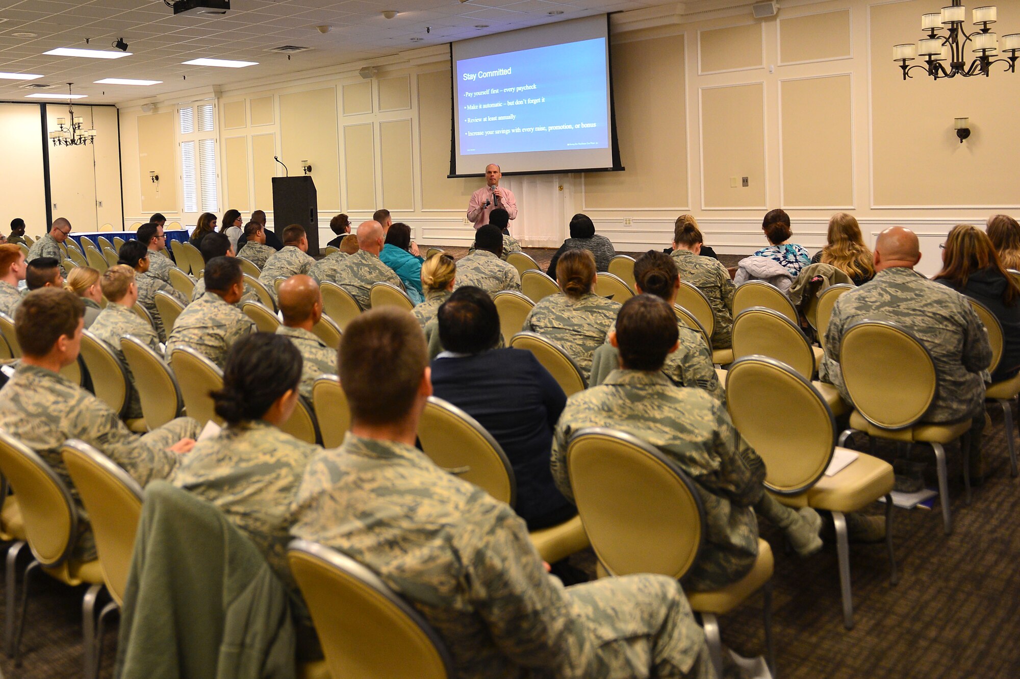 Joseph Montanaro, United Service Automobile Association financial planner, briefs Team Shaw members on social security and savings plans during Heroes at Home, a financial event, at the Carolina Skies Club and Conference Center at Shaw Air Force Base, S.C., March 15, 2017. Throughout the event, service members were given insight and tips on how to properly manage finances as well as the benefits of savings plans and building credit. (U.S. Air Force photo by Airman 1st Class Christopher Maldonado)
