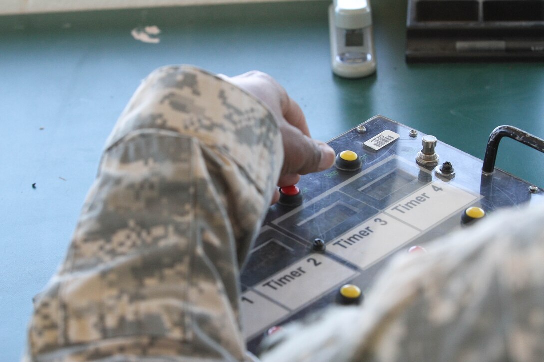 FORT MCCOY, Wis. - A U.S. Army Reserve Soldier runs the timer for gunnery table four during Operation Cold Steel at McCoy, Wis., March 15, 2017. Crews are timed on their target engagements. Operation Cold Steel is the U.S. Army Reserve's crew-served weapons qualification and validation exercise to ensure that America's Army Reserve units and soldiers are trained and ready to deploy on short-notice and bring combat-ready and lethal firepower in support of the Army and our joint partners anywhere in the world. (U.S. Army Reserve photo by Staff Sgt. Debralee Best, 84th Training Command)