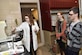 As part of the Engineers Engineer for a Day activities Feb. 22, AEDC analyst Mary Forde, pictured left, explains flash point testing to students interested in Chemical Engineering. Visiting the AEDC Chemistry Laboratory are, pictured at right, Fayetteville High School student Kaytlin Hobbs and Community High School student Brandon Waller. (U.S. Air Force photo/Rick Goodfriend)