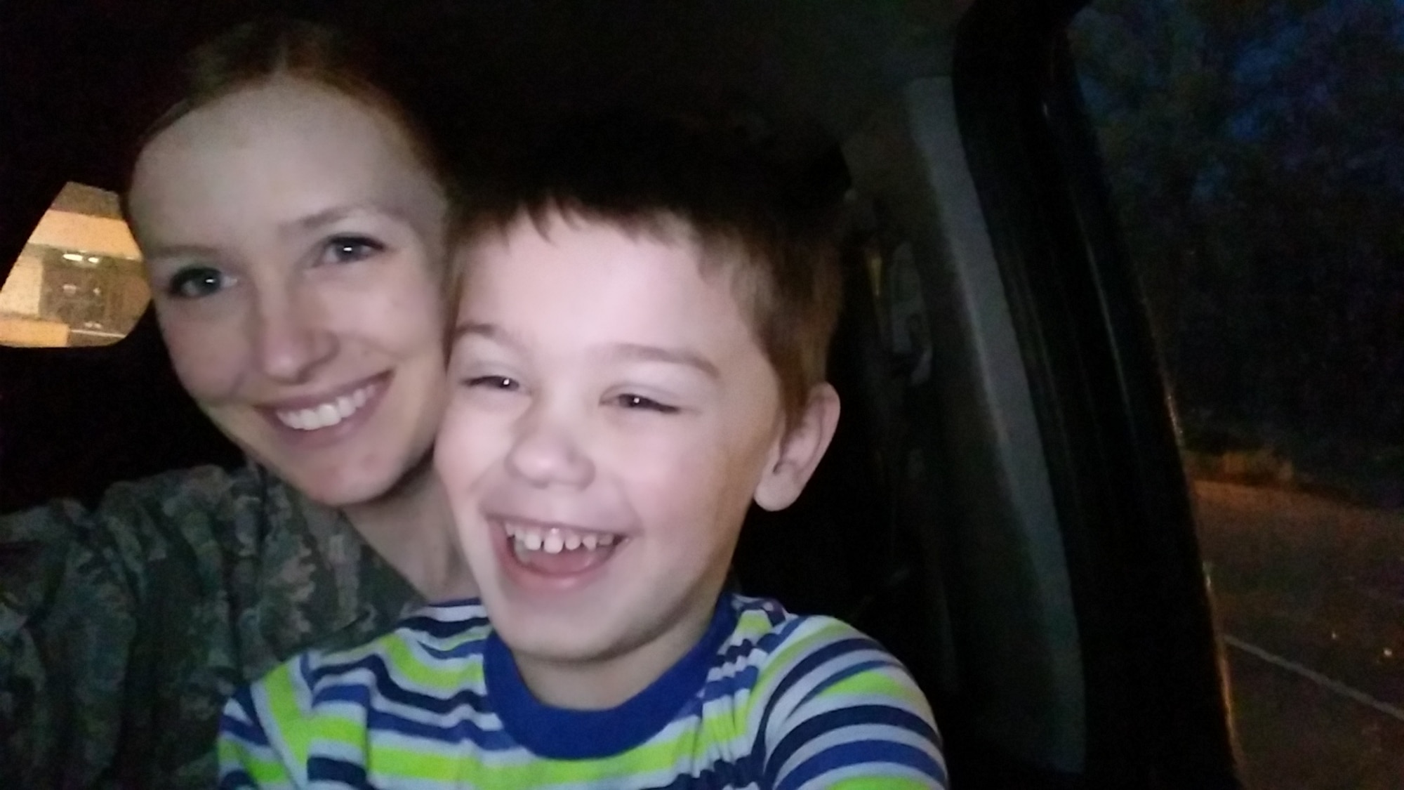 U.S. Air Force Senior Airman Katie Cogbill, 19th Medical Operations Squadron medical technician, takes a selfie with her son, Barrett. (Courtesy photo)