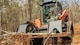 U.S. Air Force Staff Sgt. Thomas Adams, a civil engineer with the 116th Air Control Wing, Georgia Air National Guard, removes trees and debris with a Kubota while clearing a 20-foot wide, 1.5 mile trail through a five-acre area at Wellston Park, Warner Robins, Ga., March 5, 2017. The engineers partnered with the City of Warner Robins to assist in the completion of Wellston Park through the Innovative Readiness Training (IRT) program. The IRT program is a US military volunteer training opportunity that provides training and readiness for military personnel while addressing public and civil-society needs. (U.S. Air National Guard photo by Senior Master Sgt. Roger Parsons)