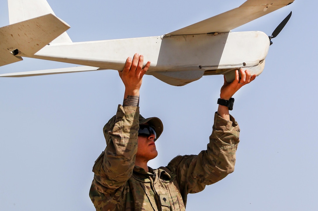 Army Spc. Taylor S. Tennant prepares to launch a Puma unmanned aerial vehicle near Al Tarab, Iraq, March 12, 2017. Tennant is assigned to the 82nd Airborne Division’s 2nd Brigade Combat Team, Combined Joint Task Force-Operation Inherent Resolve. Army photo by Staff Sgt. Jason Hull