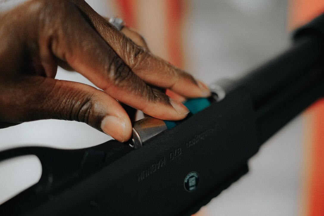 Chief Master Sgt. of the Air Force Kaleth O. Wright loads an M870 shotgun at Joint Base Andrews, Md., March 14, 2017. Wright’s visit afforded him the opportunity to learn and interact with Airmen of the 11th Security Support Squadron . (U.S. Air Force photo by Senior Airman Delano Scott)