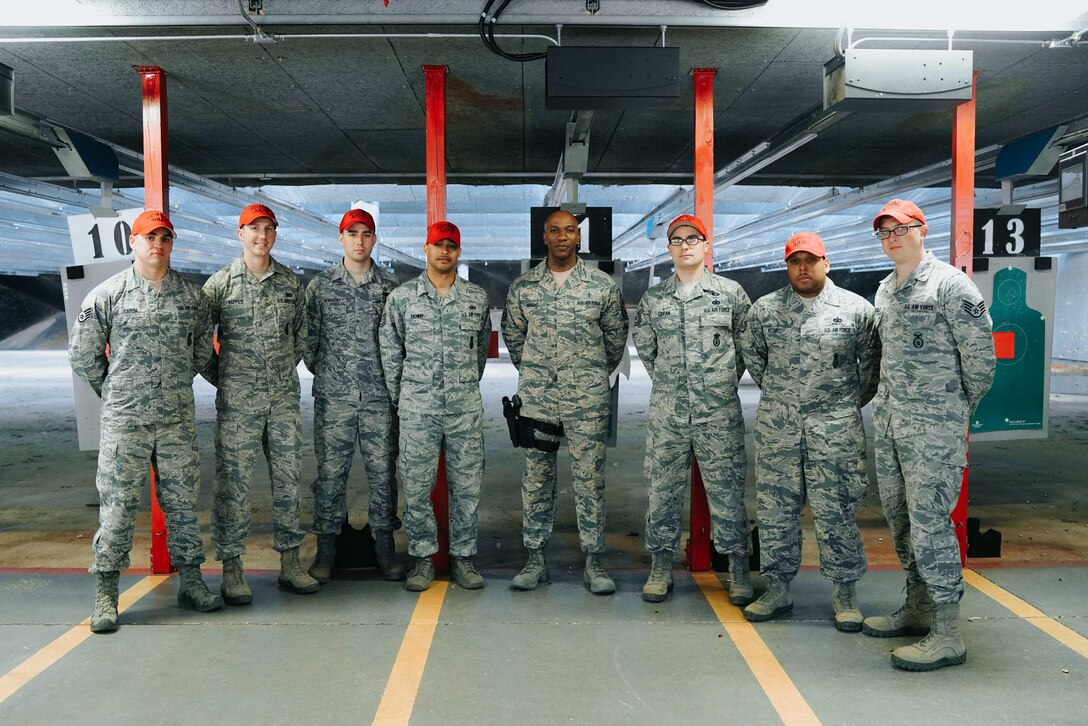 Chief Master Sgt. of the Air Force Kaleth O. Wright and 11th Security Support Squadron Combat Arms instructors pose for a photo at the firing range at Joint Base Andrews, Md., March 14, 2017. Wright’s visit afforded him the opportunity to learn and interact with Airmen of the 11th Security Support Squadron. (U.S. Air Force photo by Senior Airman Delano Scott) 