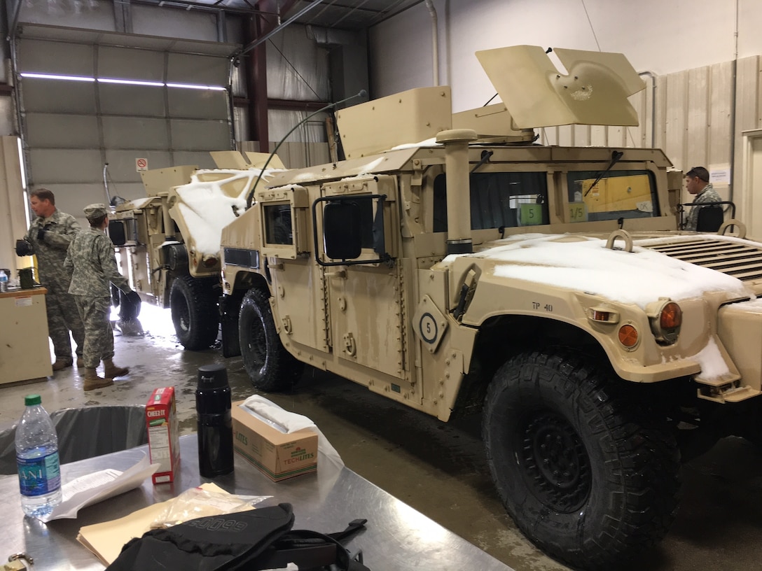 Soldiers of the 371st Chemical Company out of Greenwood, S.C., are performing Preventive Maintenance Checks and Services (PMCS) on their High Mobility Multipurpose Wheeled Vehicle (HMMWV), prior to going to the range and conduct live-fire gunnery exercise during Operation Cold Steel held at Fort McCoy, Wis., March 13, 2017.  
Operation Cold Steel is a new individual/crew and collective live fire exercise in the Army Reserve taking place Mar 8 to April 25 at Fort McCoy, Wis. The crew-served and platform qualifications are identified as key foundational elements of a unit’s training assessments.  In accordance with “Objective T” requirements for 76th Division (OR) Army Early Response Forces (AERF) units, all units must now conduct annual crew-served and platform qualifications in accordance to meet directed readiness objectives.  The intent of the AERF is to preserve readiness and increase responsiveness of select capabilities required for contingent sourcing. The AERF construct will accomplish this intent by providing predictable requirements for reserve units.