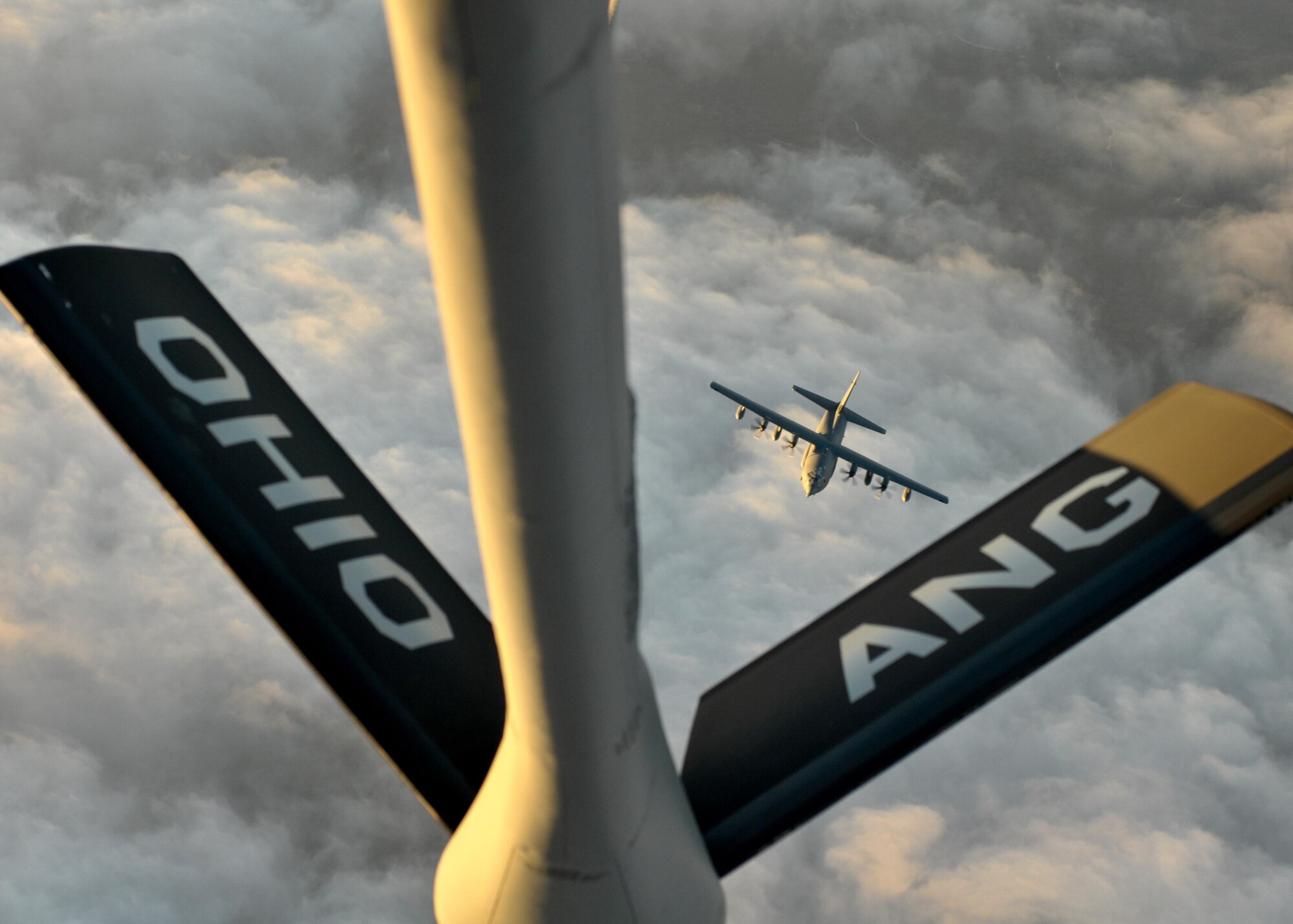 A U.S. Air Force MC-130J Commando II with the 9th Special Operations Squadron approaches a KC-135R Stratotanker with the 121st Air Refueling Wing, Ohio Air National Guard, for refueling during a training sortie in support of Emerald Warrior 17 March 7, 2017. Emerald Warrior is a U.S. Special Operations Command exercise during which joint special operations forces train to respond to various threats across the spectrum of conflict. (U.S. Air National Guard photo by Senior Airman Ashley Williams)