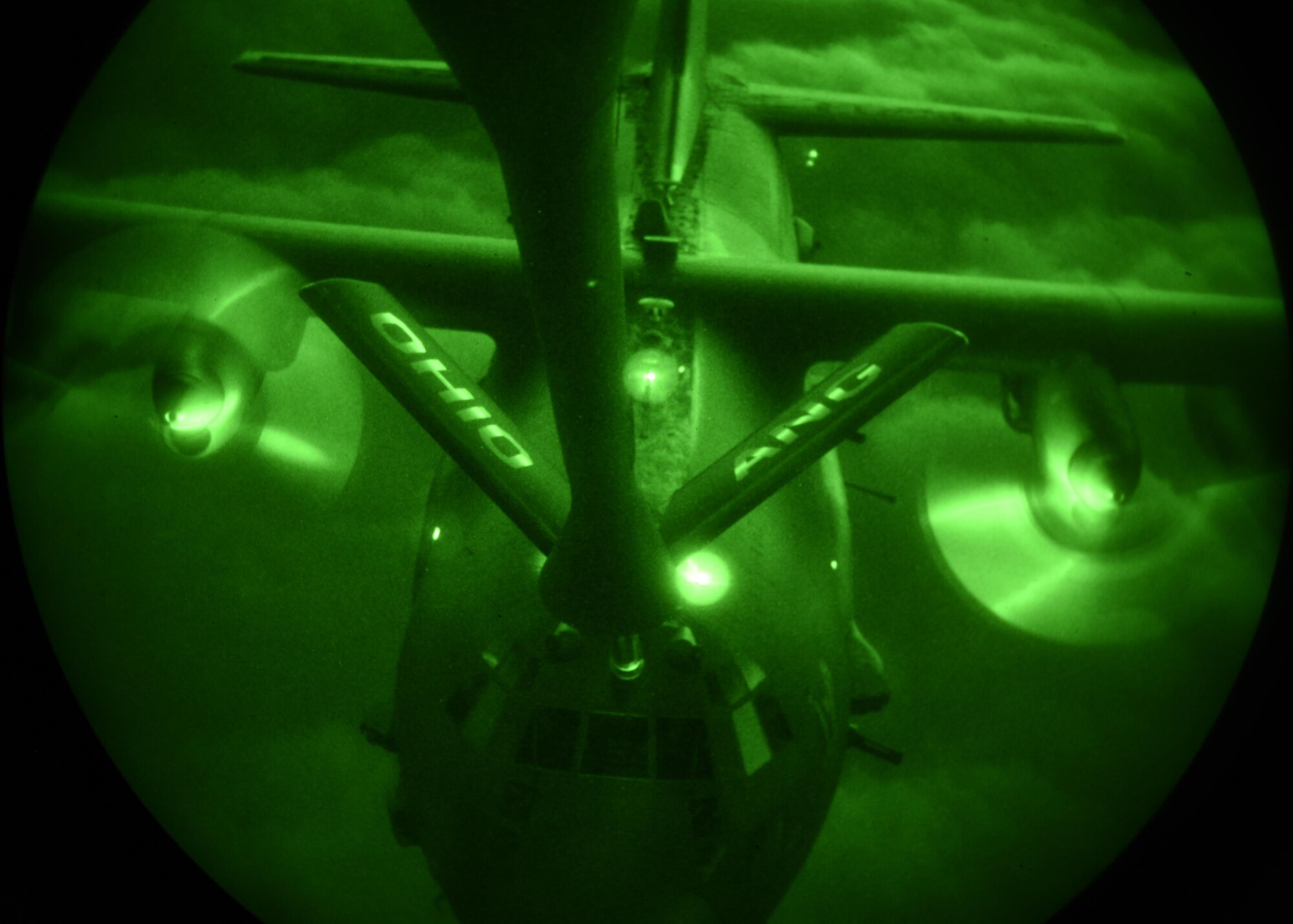 A U.S. Air Force AC-130U Spooky with the 4th Special Operations Squadron receives fuel from a KC-135R Stratotanker with the 121st Air Refueling Wing, Ohio Air National Guard, for refueling during a training sortie in support of Emerald Warrior 17 March 7, 2017. Emerald Warrior is a U.S. Special Operations Command exercise during which joint special operations forces train to respond to various threats across the spectrum of conflict. (U.S. Air National Guard photo by Senior Airman Ashley Williams)