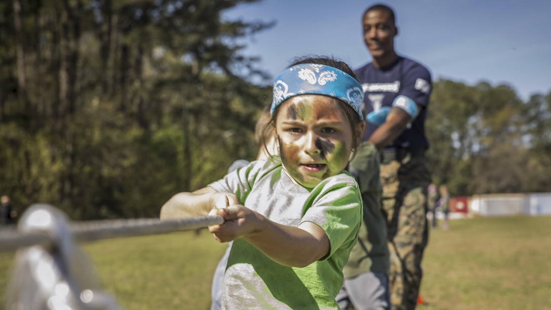 A child participates in tug of war during a "Mini Marines" event for military children at Marine Corps Air Station Beaufort, S.C., March 11, 2017. Marine Corps photo by Lance Cpl. Ashley Phillips
