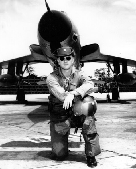 Then Maj. Richard "Gene" Smith poses for a photo in front of his F-105 Thunderchief in 1967 in South East Asia. For his time at Columbus Air Force Base, Mississippi, and his bravery during his years as a POW, the Ceremonial Plaza in front of the wing headquarters building was renamed the Richard "Gene" Smith Plaza. 
