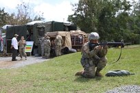 A 49th Multifunctional Medical Battalion Soldier provides security as the Food Service Team conducts field feeding operations during the 2017 Connelly in Puerto Nuevo, Puerto Rico.