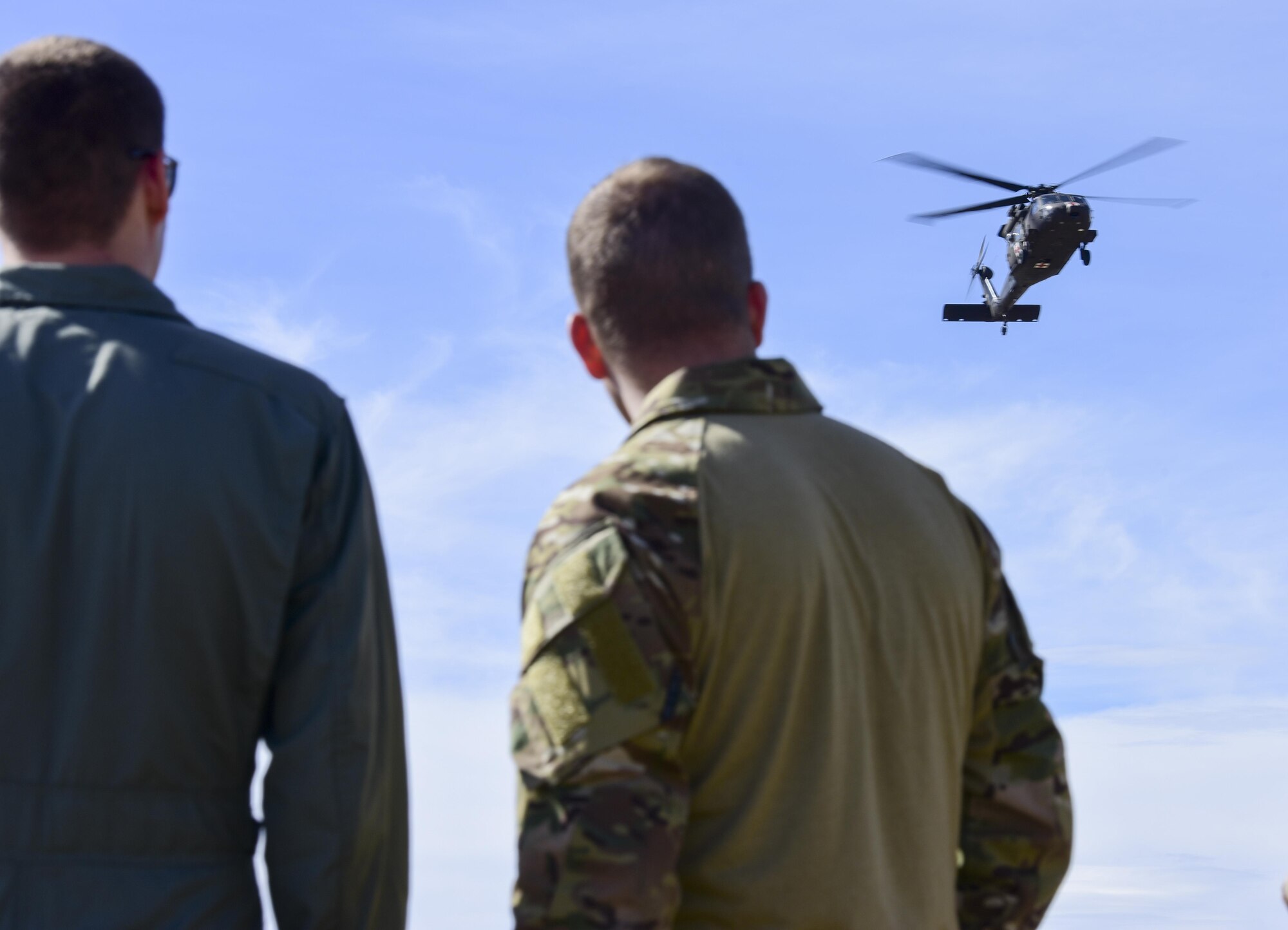 An HH-60M Black Hawk helicopter hovers above their landing zone during exercise Combat Raider at the Powder River Training Complex, north of Belle Fourche, S.D., March 15, 2017. Two Black Hawks from the South Dakota National Guard participated in the exercise, providing a medical evacuation for Airmen acting as downed pilots. (U.S. Air Force photo by Airman 1st Class Randahl J. Jenson)