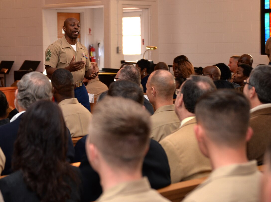 Sgt. Maj. Johnny L. Higdon, sergeant major, Marine Corps Logistics Base Albany, addresses Marines and civilian-Marines during a post and relief ceremony at the Chapel of the Good Shepherd, here, March 16.  