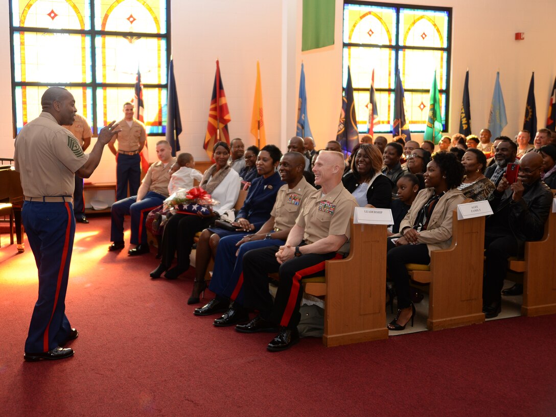 Sgt. Maj. Kenneth V. Agee, former sergeant major, Marine Corps Logistics Base Albany, addresses family members, Marines and civilian-Marines during a retirement ceremony at the Chapel of the Good Shepherd, here, March 16.