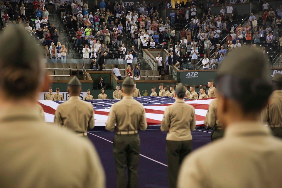 Marines with Bravo Co., Communication Training Battalion, Marine Corps Communication-Electronics School, present the national colors during the 15th Banque Nationale de Paris Paribas Open’s “Salute to Heroes,” in Indian Wells, Calif., March 10, 2017. This event began in 2002 after Sept. 11, and is meant to celebrate, recognize and honor all service men and women as well as first responders. (U.S. Marine Corps photo by Cpl. Medina Ayala-Lo)