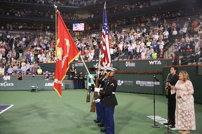 The Headquarters Battalion Color Guard presents the national and Marine Corps colors during the 15th Banque Nationale de Paris Paribas Open’s “Salute to Heroes,” in Indian Wells, Calif., March 10, 2017. This event began in 2002 after Sept. 11, and is meant to celebrate, recognize and honor all service men and women as well as first responders. (U.S. Marine Corps photo by Cpl. Medina Ayala-Lo)