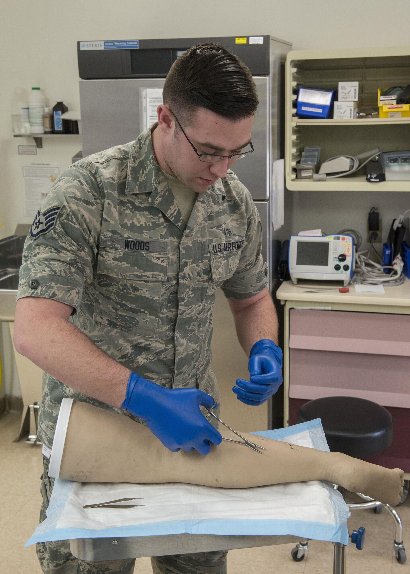 Staff Sgt. Joshua Woods, 366th Medical Group aerospace medical technician, demonstrates the correct way to stitch a wound March 16, 2017, at Mountain Home Air Force Base, Idaho. Aerospace medical technicians learn their craft at Ft. Sam Houston, Texas, during their 98 day technical school. (U.S. Air Force photo by Airman Jeremy D. Wolff/Released)
