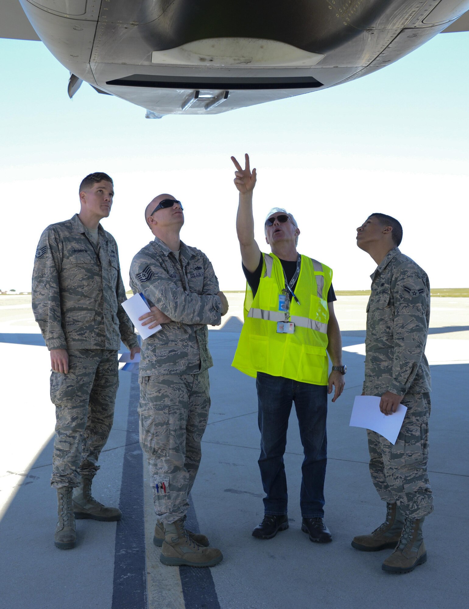 Steve Bentley, second from the right, a Boeing quality assurance lead, shows 60th Air Mobility Wing Airmen the KC-46A Pegasus March 8, 2017, at Travis Air Force Base, Calif. Travis was selected in January as a preferred location for the Air Force's newest refueling aircraft. (U.S. Air Force photo by Senior Airman Amber Carter) 