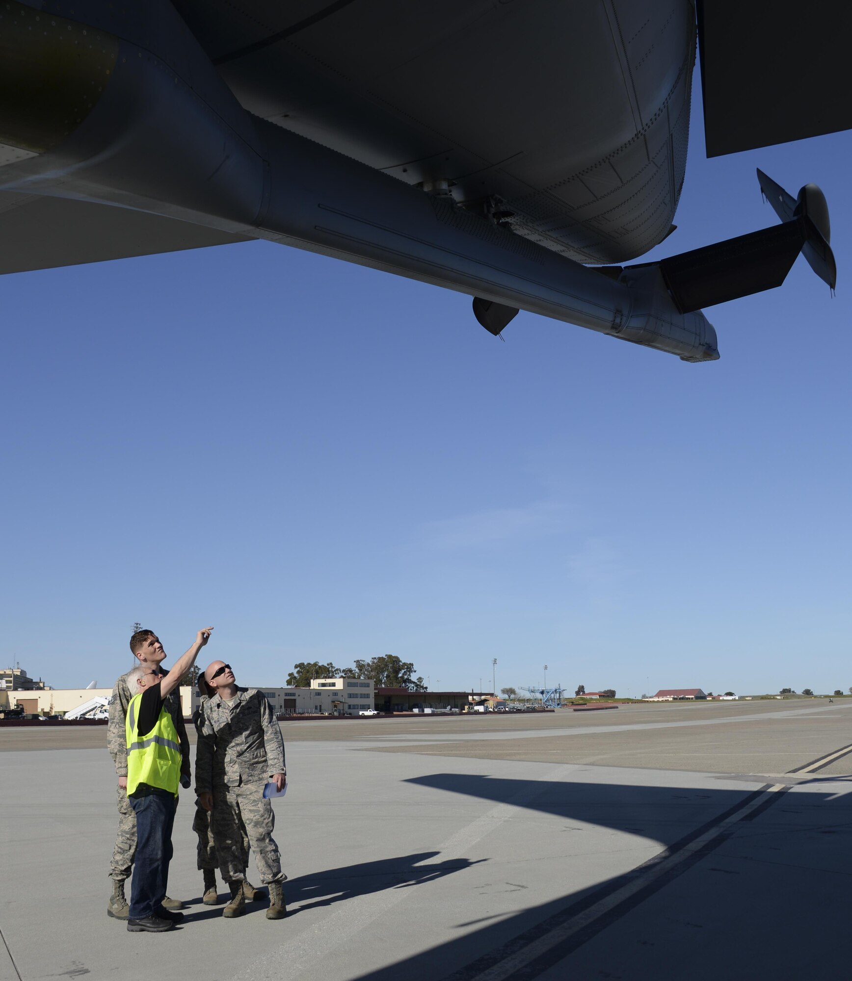 Steve Bentley, front, a Boeing quality assurance lead, shows 60th Air Mobility Wing Airmen the KC-46A Pegasus March 8, 2017, at Travis Air Force Base, Calif. Travis was selected in January as a preferred location for the Air Force's newest refueling aircraft. (U.S. Air Force photo by Senior Airman Amber Carter) 