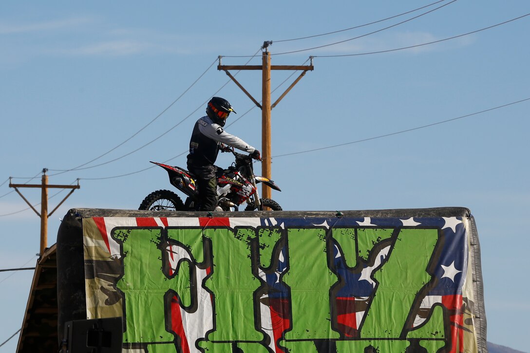 Jimmy Fitzpatrick checks out the landing ramp before starting his stunts during the Motocross Jam Fest, at 13th and Dunham aboard Marine Corps Air Ground Combat Center, Twentynine Palms, Calif., March 11, 2017. Marine Corps Community Services hosts the Motocross Jam Fest annually to provide Combat Center patrons with the opportunity to enjoy time out with their family and friends. (U.S. Marine Corps photo by Lance Cpl. Natalia Cuevas)