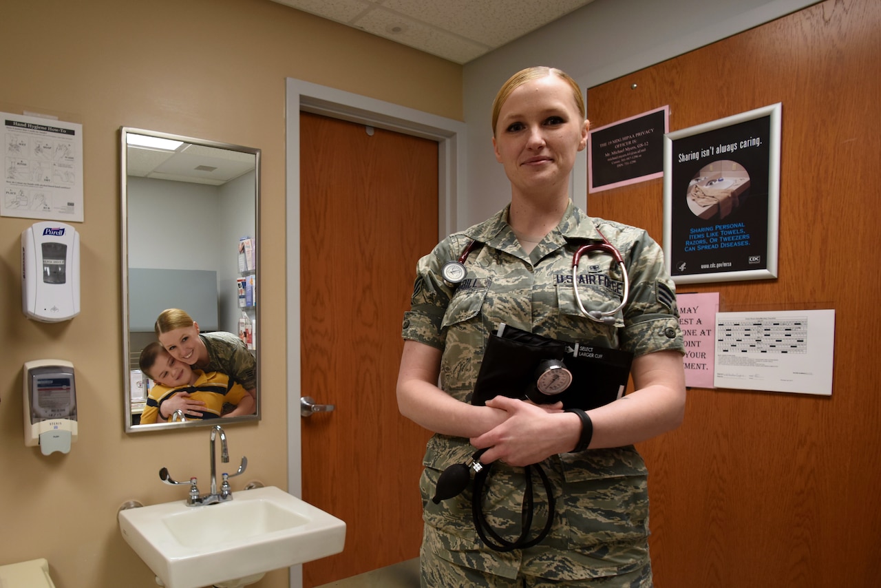 U.S. Air Force Senior Airman Katie Cogbill, 19th Medical Operations Squadron medical technician, works at the Women’s Health Clinic on Little Rock Air Force Base, Ark. Cogbill received the 19th Airlift Wing Airman of the Year Jan. 27, 2017. (U.S. photo illustration by Senior Airman Mercedes Taylor)
