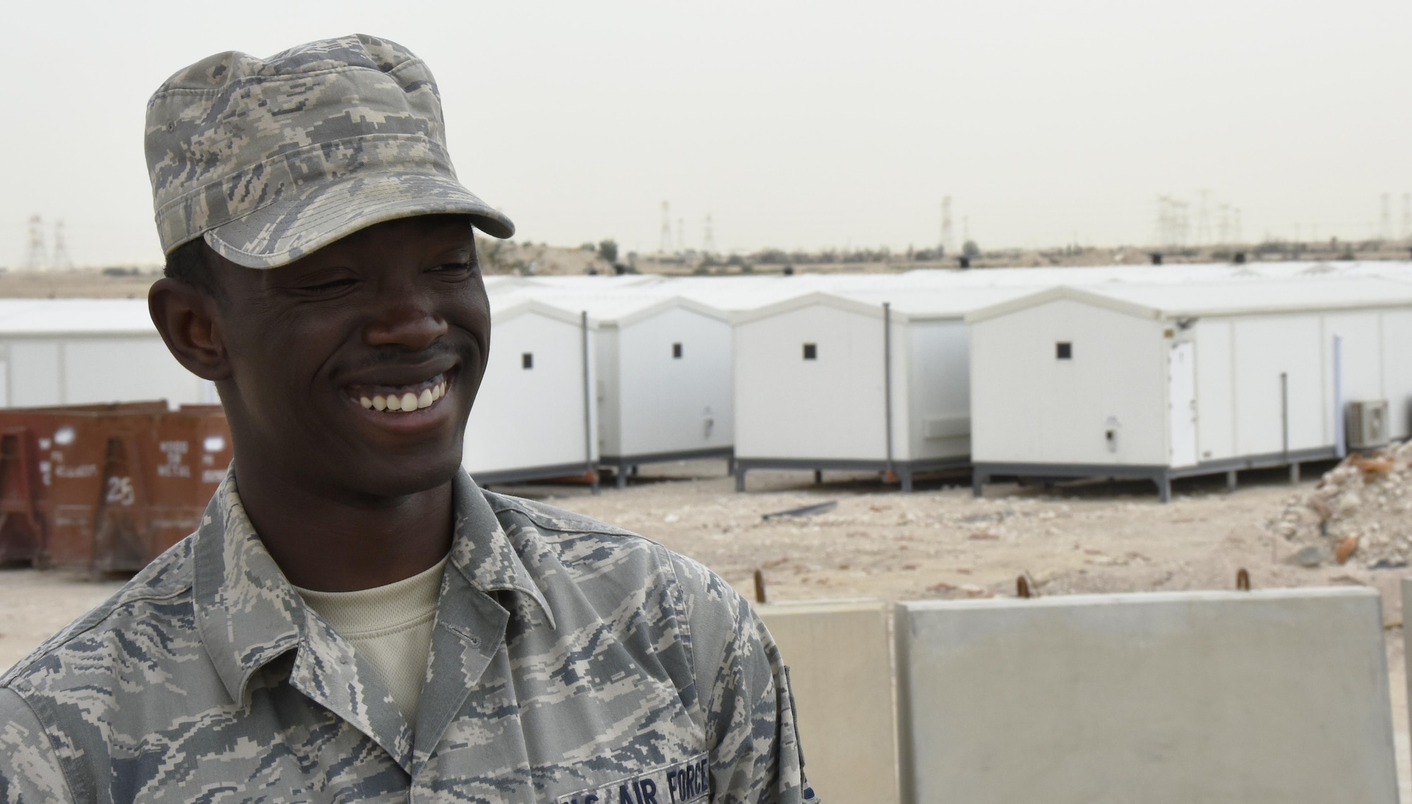 U.S. Air Force Tech. Sgt. Dominique Knowles, project manager with the 379th Expeditionary Civil Engineer Squadron Water and Fuels Section, poses for a photo at Al Udeid Air Base, Qatar, March 15, 2017. Knowles is the project manager for the replacement portion of the 379th ECES cadillac trailer plan, one part of the continued improvement of facilities at Al Udeid AB. (U.S. Air Force photo by Senior Airman Cynthia A. Innocenti)
