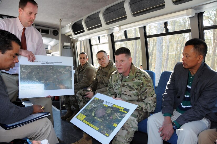 Col. Martin Klein, U.S. Army Support Activity Fort Dix commander, discusses range capabilities March 17 at Joint Base McGuire-Dix-Lakehurst, New Jersey, during a bus tour as part of a congressional staff visit.  The joint base spans more than 20 miles east to west equaling 42,000 contiguous acres.  Joint Base McGuire-Dix-Lakehurst is home to more than 80 mission partners who provide a wide range of combat capability.