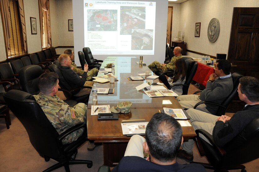 Col. Martin Klein (lower left), U.S. Army Support Activity Fort Dix commander, discusses long-range planning with congressional staff members March 17.  The joint base spans more than 20 miles east to west equaling 42,000-continguous acres.  Joint Base McGuire-Dix-Lakehurst is home to more than 80 mission partners who provide a wide range of combat capability.