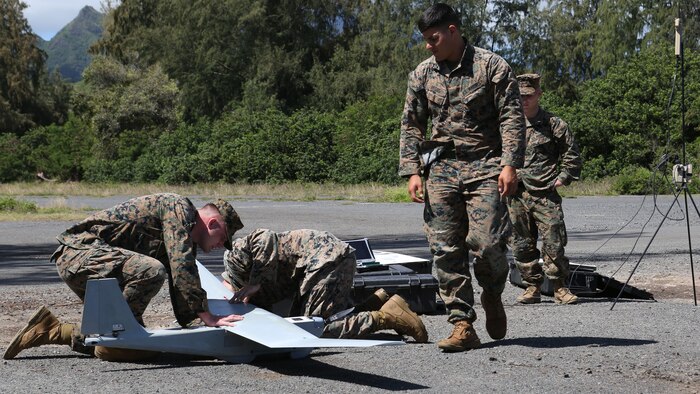Cpl. Martin Decos observes the Unmanned Aerial System before take-off at Marine Corps Training Area Bellows, March 8, 2017. The UAS is mainly used for aerial reconnaissance and can also be used for observation, local security, targeting, and prosecuting. 