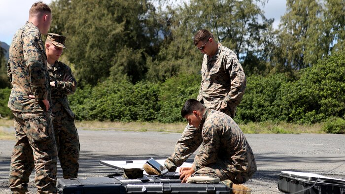 Marines with 1st Battalion, 12th Marine Regiment, do last minute checks to make sure their Unmanned Aerial System doesn’t fail at Marine Corps Training Area Bellows, Hawaii, March 8, 2017. The UAS is mainly used for aerial reconnaissance and can also be used for observation, local security, targeting, and prosecuting. 