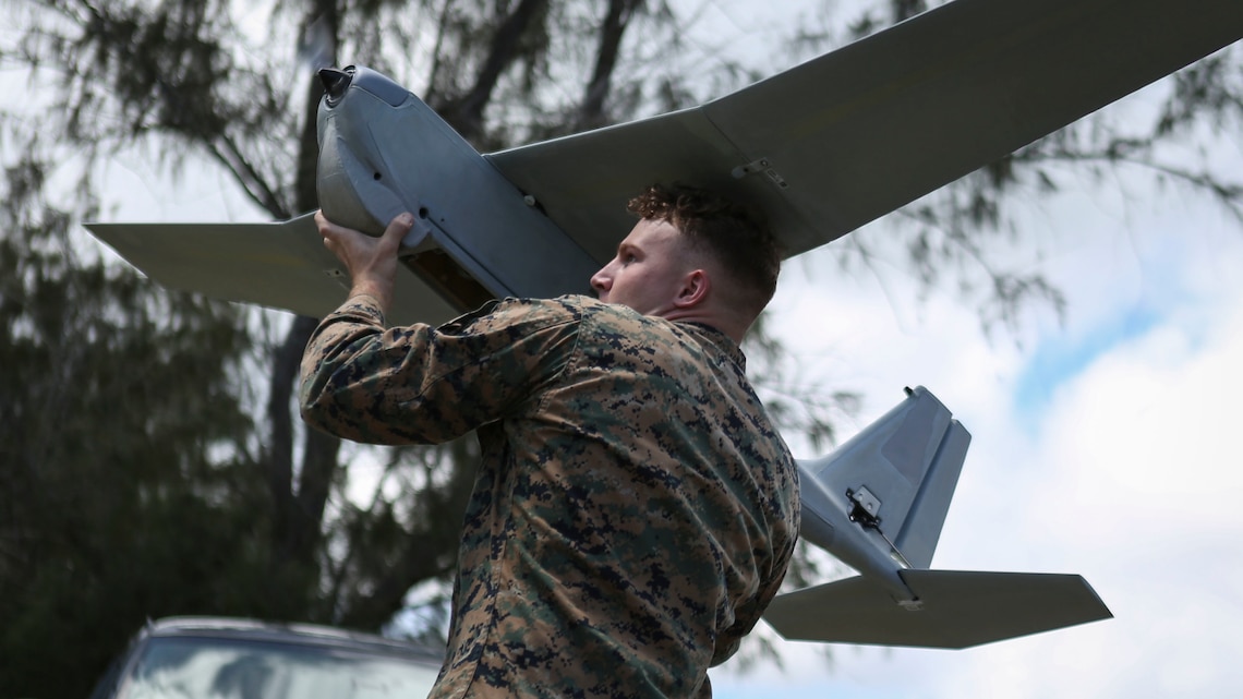 Lance Cpl. Nicholas Powell, a Marine with 1st Battalion, 12th Marine Regiment, prepares to throw the Unmanned Aerial System at Marine Corps Training Area Bellows, Hawaii, March 8, 2017. The UAS is mainly used for aerial reconnaissance and can also be used for observation, local security, targeting, and prosecuting. 