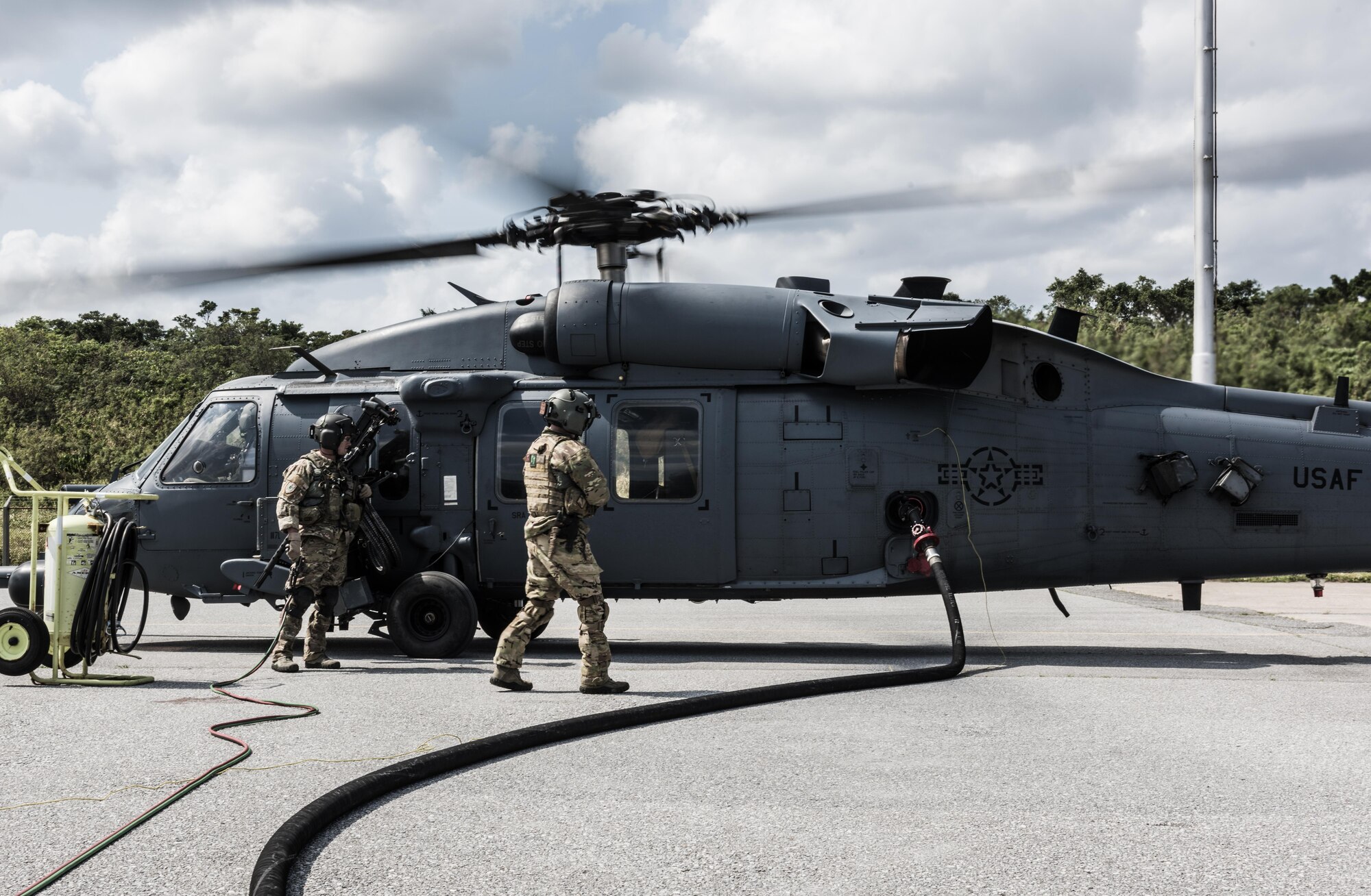 Airmen from the 33rd Rescue Squadron conducted hot-refueling during routine training on the flightline March 7, 2017, at Kadena Air Base, Japan. Hot-refueling occurs when refueling an aircraft on the ground while the engines are still running. (U.S. Air Force photo by Senior Airman Omari Bernard)