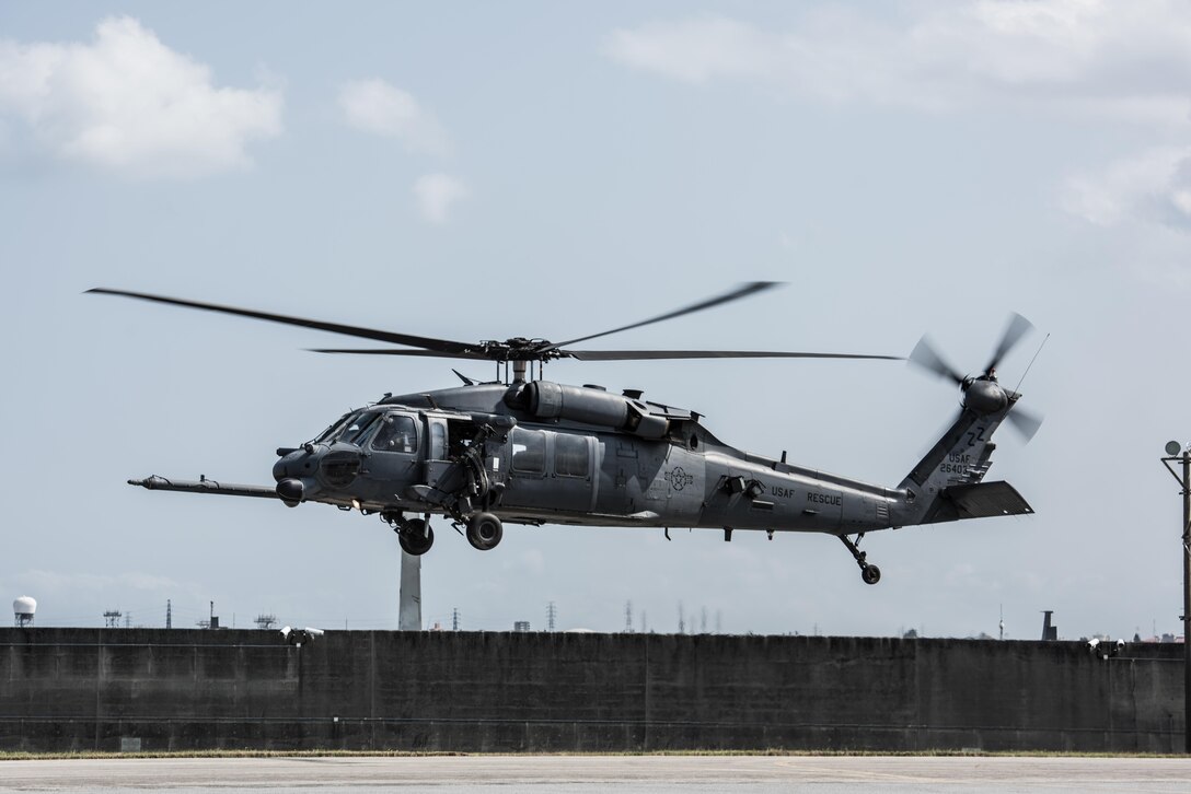 An HH-60 Pavehawk takes off from the flightline during routine training March 7, 2017, at Kadena Air Base, Japan. The 33rd Rescue Squadron trains for water survival, search and rescue, close air support and maritime defense and interdiction. (U.S. Air Force photo by Senior Airman Omari Bernard)