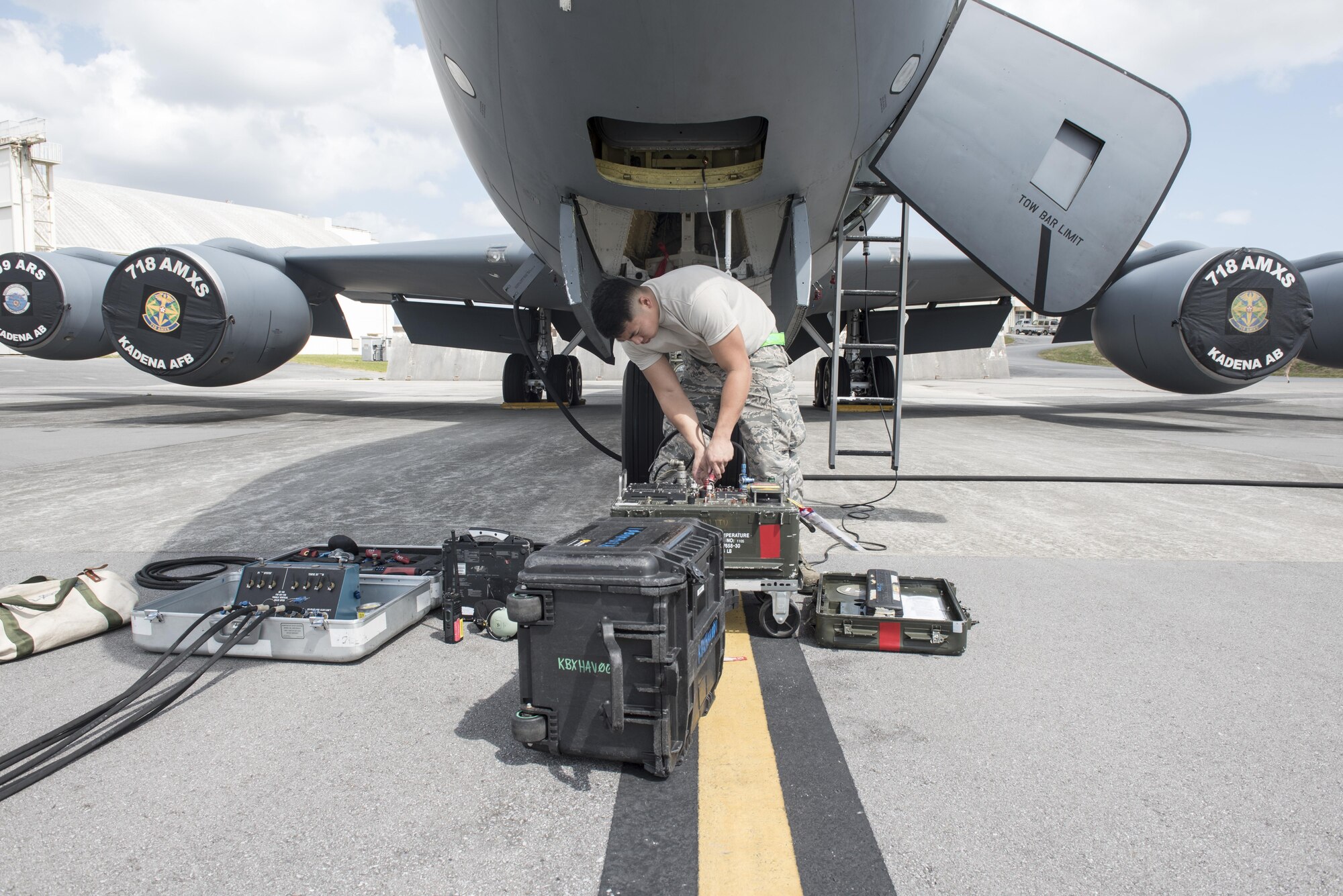 U.S. Air Force Airman 1st Class Ryan Celestino, 909th Aircraft Maintenance Unit instrument and flight control systems journeyman, turns on a TTU-205J test set to perform pitot-static tests for the KC-135R March 15, 2017, at Kadena Air Base, Japan. Pito-static tests allows maintainers to simulate diagnostic readings for jets in the air on the ground. (U.S. Air Force photo by Senior Airman Omari Bernard)