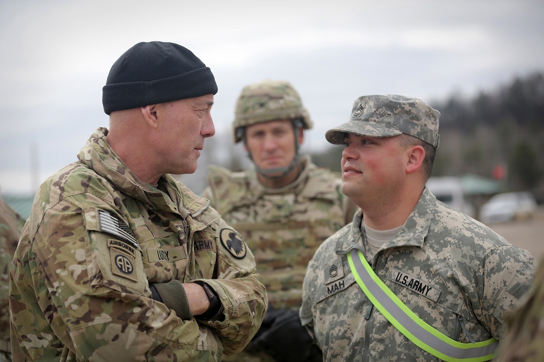 LTG Charles Luckey, left, Commanding General, U.S. Army Reserve, briefly meets with Sgt. 1st Class Joseph Mah, one of a few Master Gunners in the Army Reserve, during Operation Cold Steel in a second visit to the exercise at Fort McCoy, Wisconsin, Mar. 18, 2017. According to the U.S. Army Training and Doctrine Command News Center, a master gunner is a technical and tactical expert and advisor to the commander and advises the commander on anything related to the vehicle platform or weapons system and helps develop all the materials necessary to conduct gunnery and live fire exercises. Operation Cold Steel is the U.S. Army Reserve’s crew-served weapons qualification and validation exercise to ensure that America’s Army Reserve units and Soldiers are trained and ready to deploy on short-notice and bring combat-ready and lethal firepower in support of the Army and joint partners anywhere in the world. 475 crews with an estimated 1,600 Army Reserve Soldiers will certify in M2, M19 and M240 Bravo gunner platforms.
(U.S. Army Reserve photo by Master Sgt. Anthony L. Taylor)