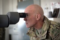 LTG Charles Luckey, Commanding General, U.S. Army Reserve, views through a spotting scope during a live-fire qualification at Operation Cold Steel in his second visit to the exercise at Fort McCoy, Wisconsin, Mar. 18, 2017. Operation Cold Steel is the U.S. Army Reserve’s first large-scale live-fire training and crew-served weapons qualification and validation exercise to ensure that America’s Army Reserve units and Soldiers are trained and ready to deploy on short-notice and bring combat-ready and lethal firepower in support of the Army and joint partners anywhere in the world. 475 crews with an estimated 1,600 Army Reserve Soldiers will certify in M2, M19 and M240 Bravo gunner platforms. 
(U.S. Army Reserve photo by Master Sgt. Anthony L. Taylor)