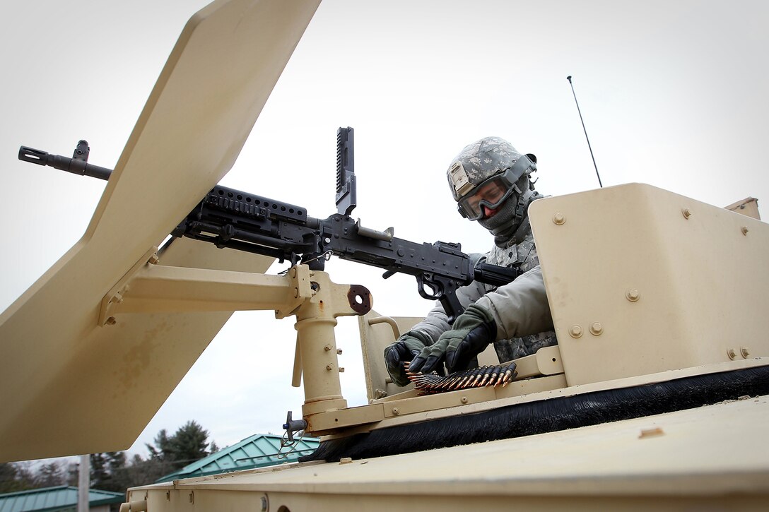 Army Reserve Spc. Dalan Benson, assigned to the 560th Movement Control Team, Springfield, Missouri, conducts pre-combat checks before a gunnery qualification lane at the Operation Cold Steel exercise at Fort McCoy, Wisconsin, Mar. 18, 2017. Operation Cold Steel is the U.S. Army Reserve’s first large-scale live-fire training and crew-served weapons qualification and validation exercise to ensure that America’s Army Reserve units and Soldiers are trained and ready to deploy on short-notice and bring combat-ready and lethal firepower in support of the Army and joint partners anywhere in the world. 475 crews with an estimated 1,600 Army Reserve Soldiers will certify in M2, M19 and M240 Bravo gunner platforms. 
(U.S. Army Reserve photo by Master Sgt. Anthony L. Taylor)