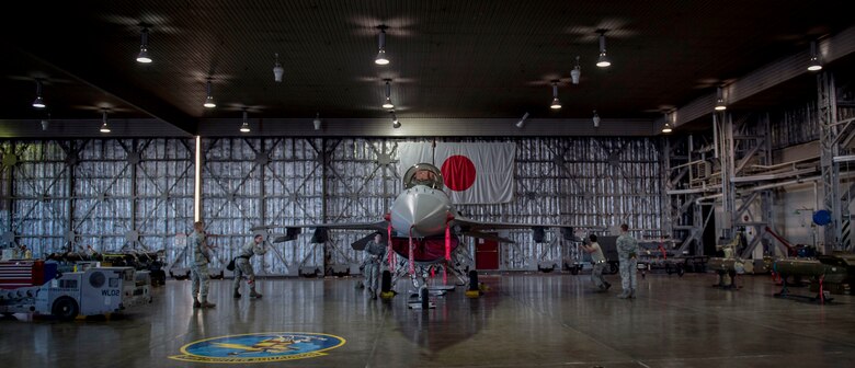 U.S. Air Force Senior Airman Aaron Paul Colbert, left, and Senior Airman Jacob D. Jennings, right, both 35th Maintenance Group weapons evaluators, assess crew 15’s loading capacities in the load barn at Misawa Air Base, Japan, Feb. 28, 2017. Misawa remains engaged in the commitment to preserve the security, stability, freedom and ensuring prosperity in the Indo-Asia-Pacific region. (U.S. Air Force photo by Tech. Sgt. Araceli Alarcon)