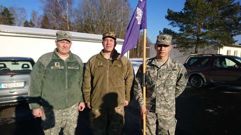 Left to right, Sgt. 1st Class John Wessely and Sgt. 1st Class Mark Korte, and Spc. Gabriel Santillanes, all with Company D, 457th Civil Affairs Battalion, 7th Mission Support Command, pose 