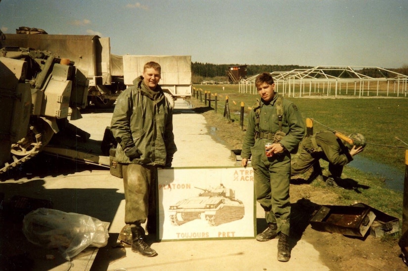 Sgt. 1st Class Mark Korte currently with Company D, 457th Civil Affairs Battalion, 7th Mission Support Command, stands during “Gunnery,” on right, in 1988 when he was previously stationed in Germany as a Regular Army active-duty Soldier. 