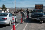 Members of the 152nd Airlift Wing's Security Forces Squadron, based in Reno, assist local authorities in the Lemmon Valley flood area in March, 2017.   Guard personnel are helping to provide traffic control and other flood recovery services.
