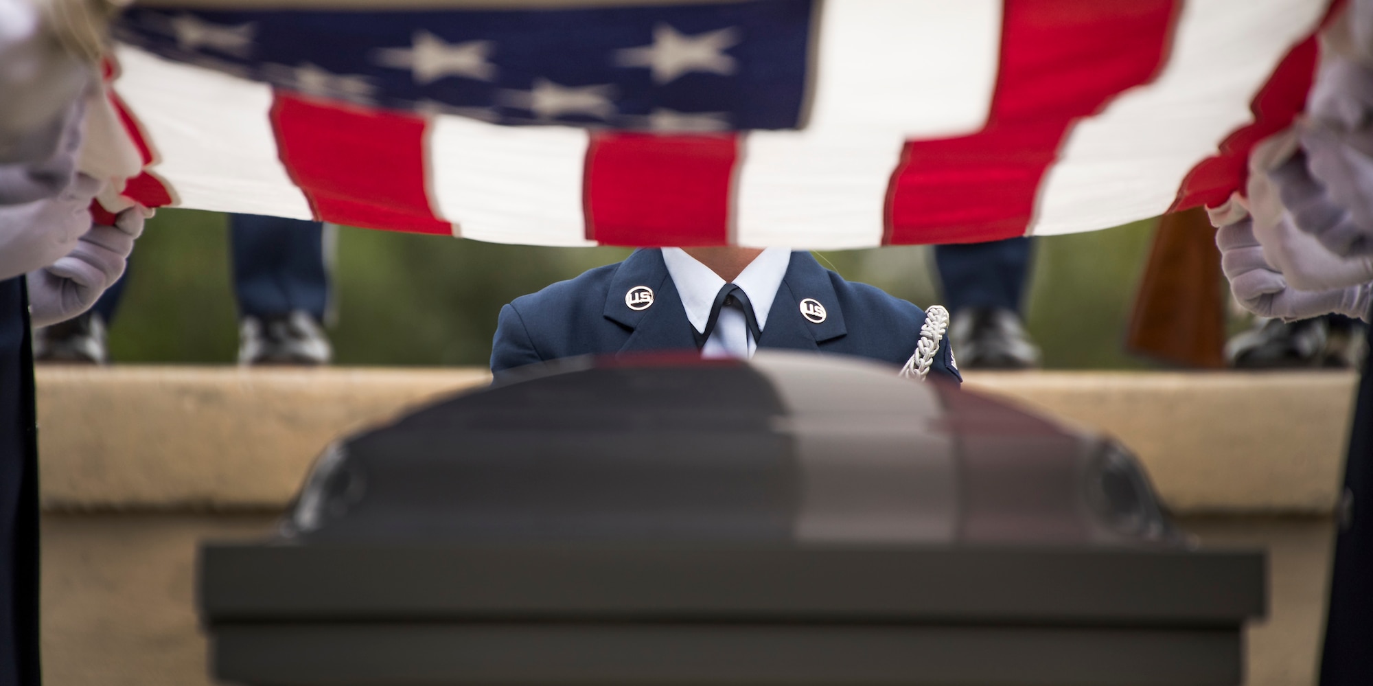 Six Honor Guard Airmen begin to the flag-folding portion at the unit’s graduation ceremony at Eglin Air Force Base, Fla., March 1.  Approximately 12 new Airmen graduated from the 120-plus-hour course. The graduation performance includes flag detail, rifle volley, pall bearers and bugler for friends, family and unit commanders. (U.S. Air Force photo/Samuel King Jr.)