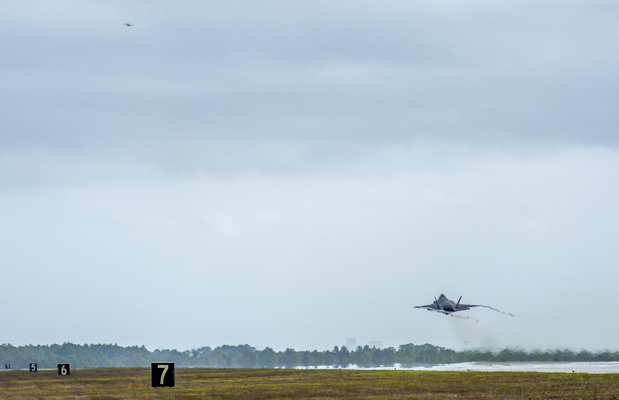 A 33rd Fighter Wing F-35A Lightning II takes off Feb. 27 to conduct sorties at Eglin Air Force Base, Fla. With conventional takeoff and landing capability, the F-35A is built for traditional Air Force bases. The F-35A is an agile, versatile, high-performance, 9g capable multirole fighter that combines stealth, sensor fusion, and unprecedented situational awareness. The 33rd Fighter Wing is a graduate flying and maintenance training wing for the F-35 Lightning II. (U.S. Air Force photo/Kristin Stewart)