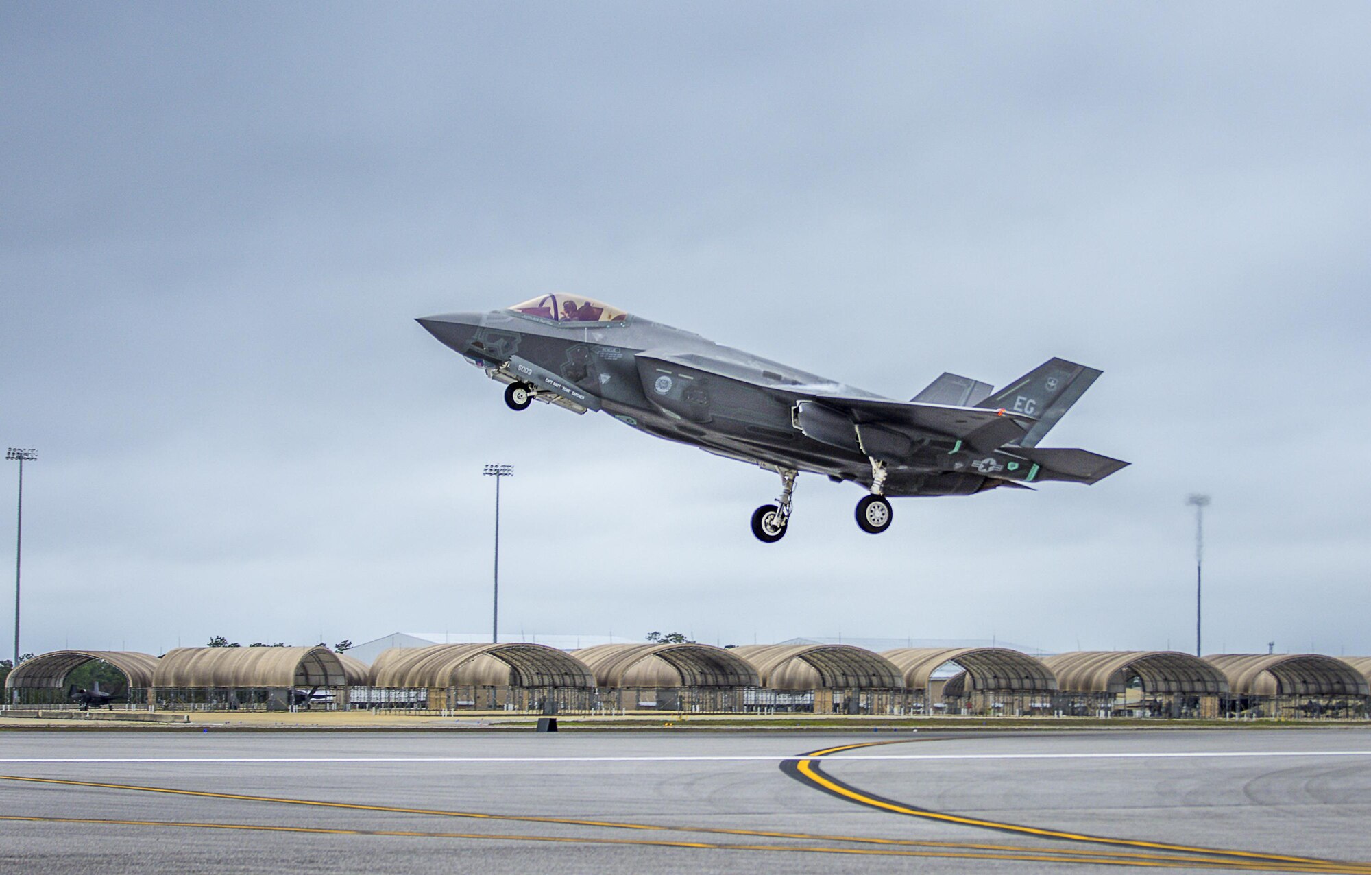 A 33rd Fighter Wing F-35A Lightning II takes off Feb. 27 to conduct sorties at Eglin Air Force Base, Fla. With conventional takeoff and landing capability, the F-35A is built for traditional Air Force bases. The F-35A is an agile, versatile, high-performance, 9g capable multirole fighter that combines stealth, sensor fusion, and unprecedented situational awareness. The 33rd Fighter Wing is a graduate flying and maintenance training wing for the F-35 Lightning II. (U.S. Air Force photo/Kristin Stewart)