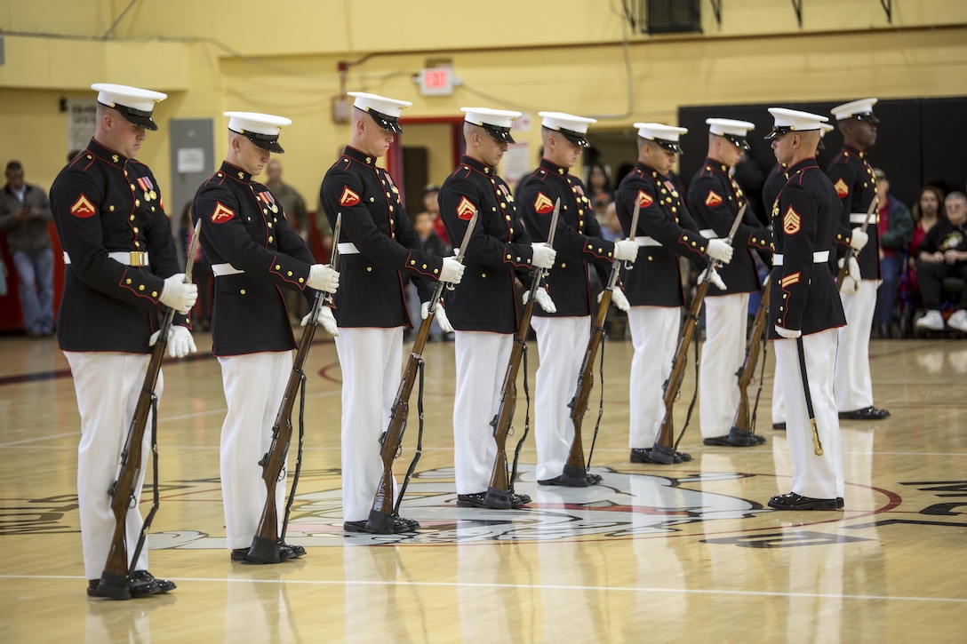 Marines with the Marine Corps Silent Drill Platoon execute “fix bayonets” during a ceremony as a part of the U.S. Marine Corps Battle Color Detachment (BCD) performance tour aboard Marine Corps Logistics Base Barstow, Barstow, Ca., Mar. 5, 2017. The BCD is comprised of the Marine Corps Silent Drill Platoon, “The Commandant’s Own,” the United States Marine Drum & Bugle Corps and the Marine Corps Color Guard. The Marines of this highly skilled unit travel across the country to demonstrate the discipline, professionalism, and “Esprit de Corps” of United States Marines. (Official Marine Corps photo by Cpl. Robert Knapp/Released)