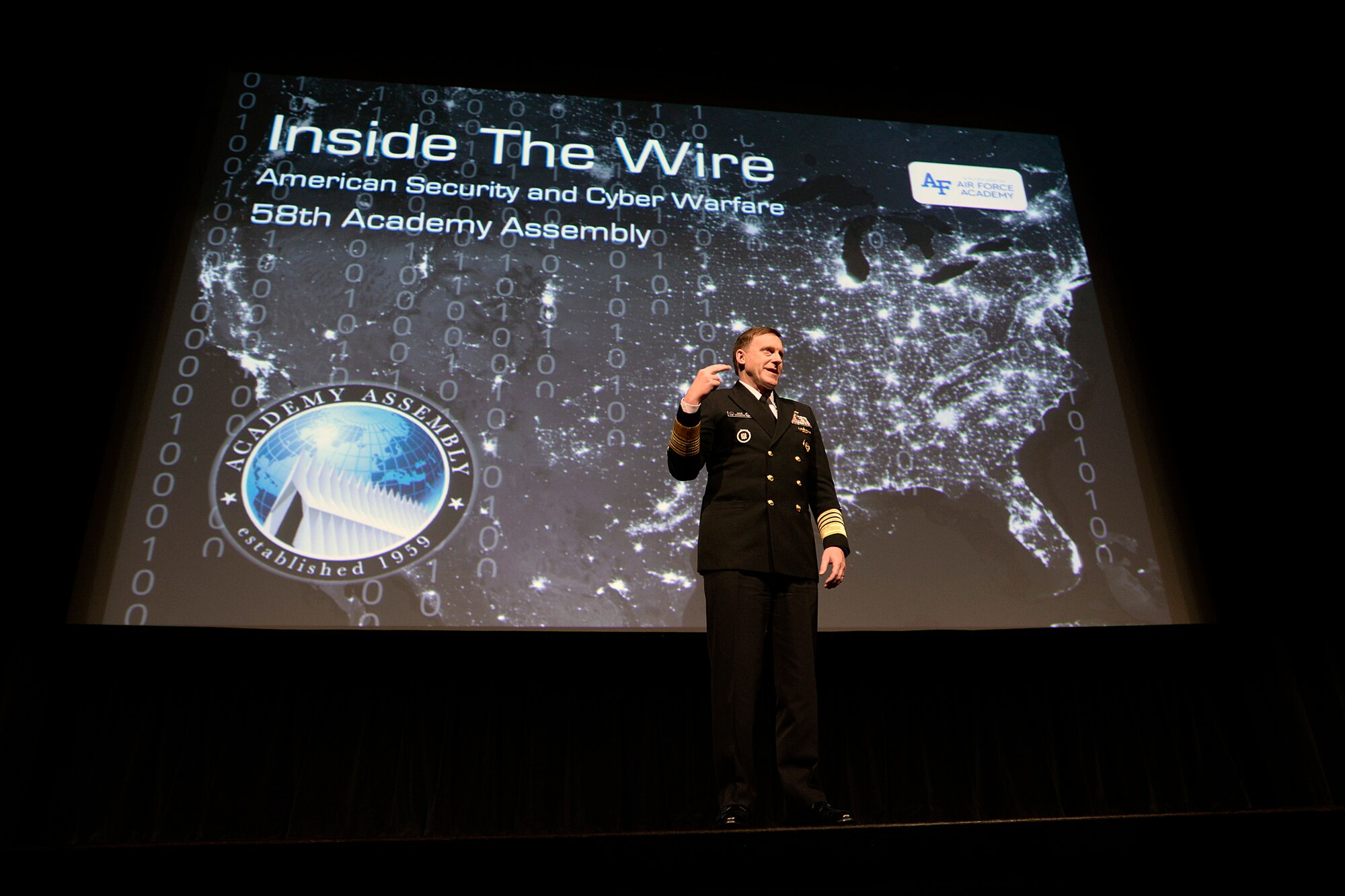 Adm. Mike Rogers, director of the National Security Agency, commander of U.S. Cyber Command commander and chief of
the Central Security Service, speaks at the Academy Assembly March 14, 2017, at the U.S. Air Force Academy. The assembly is an annual conference led by undergraduates and organized by the Academy's Political Science Department. (U.S. Air Force photo/Mike Kaplan)  


